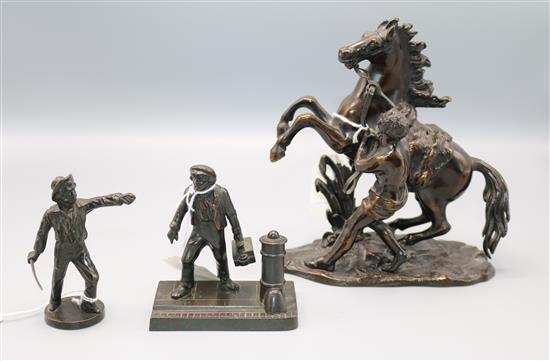 Small bronze figure of a sailor with cutlass, another of a shoe shine boy and a Marly horse group after Coustou